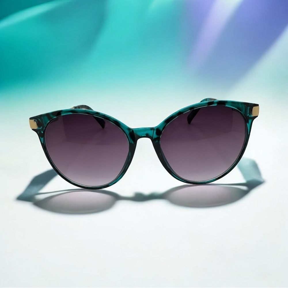 Stylish Teal Green Tortoise Shell Sunglasses with Gradient Purple Lens